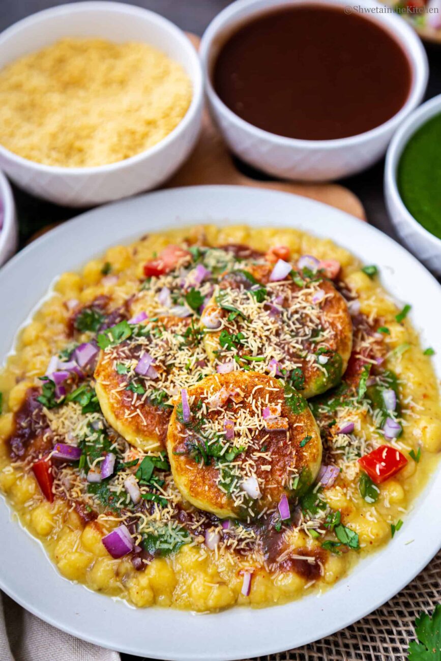 Ragda Pattice (Potato cutlets topped with white peas and chutneys)
