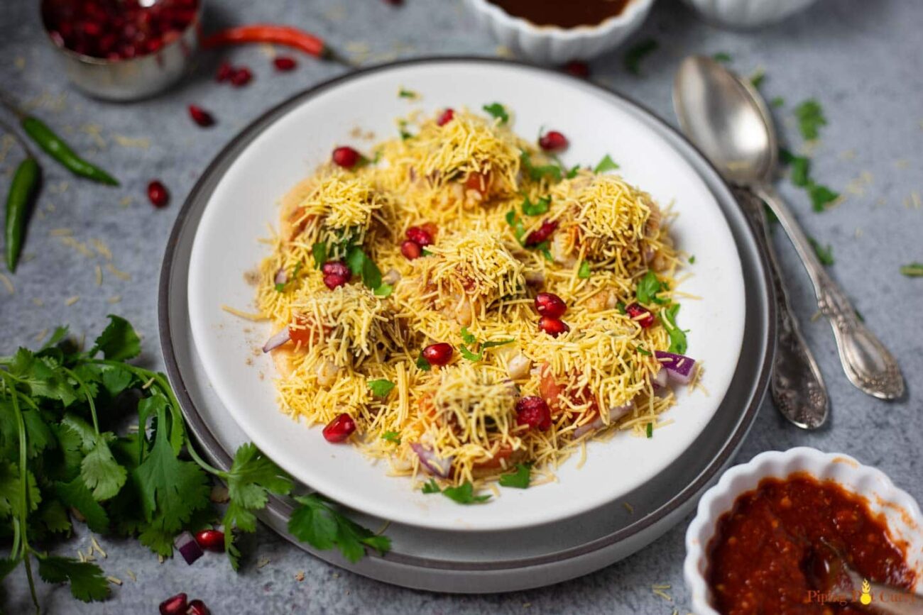 Sev Batata Puri (Crisp flour-wafer-and-potato snack)